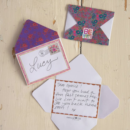 Patchwork with Busyfingers Little Envelope Letters stationery set with floral patterns and handwritten notes. Includes 'Be Happy' sticker.