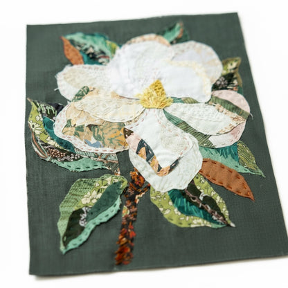 Patchwork with Busyfingers Magnolia slow-stitching kit featuring layered white fabric petals and green leaves