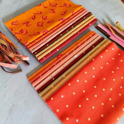 Patchwork with Busyfingers Marigold Spice fat eighth fabric pack featuring 8 assorted cotton prints in warm tones.