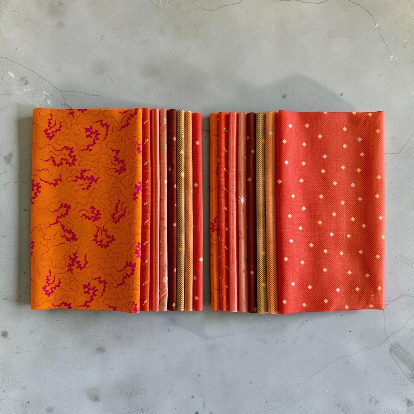 Patchwork with Busyfingers Marigold Spice fat eighth cotton fabric pack featuring 8 assorted warm orange patterned prints