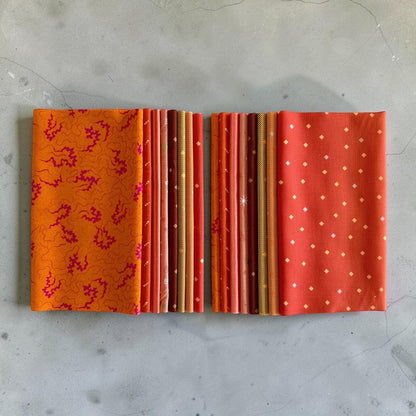Patchwork with Busyfingers Marigold Spice fat eighth cotton fabric pack featuring 8 assorted warm orange patterned prints