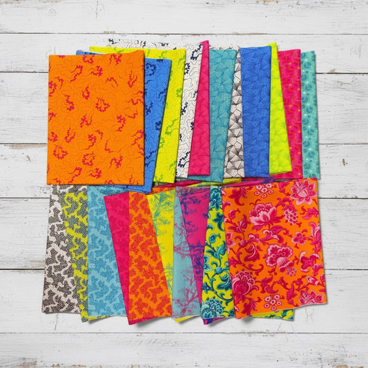Patchwork with Busyfingers Miscellany 21pc cotton fabric bundle featuring vibrant floral and geometric patterns.