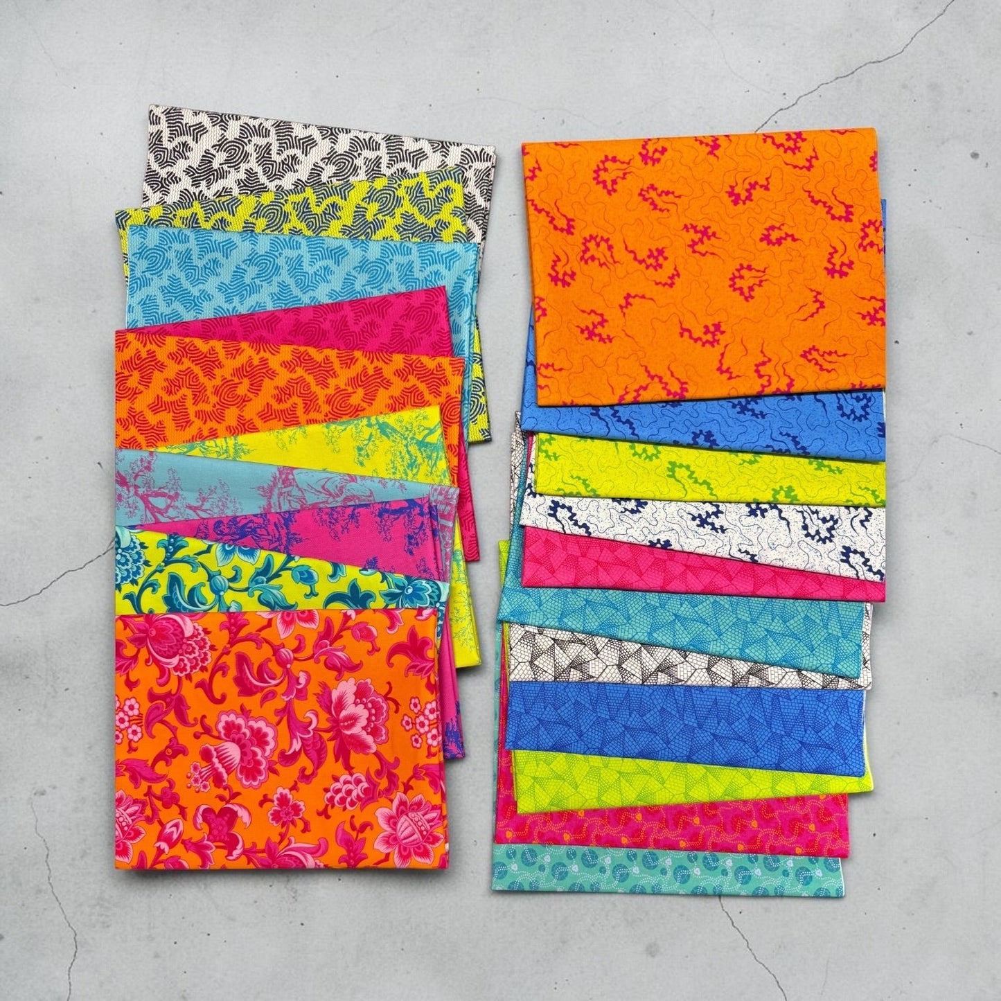 Patchwork with Busyfingers Miscellany 21pc cotton fabric bundle featuring vibrant floral and geometric patterns.