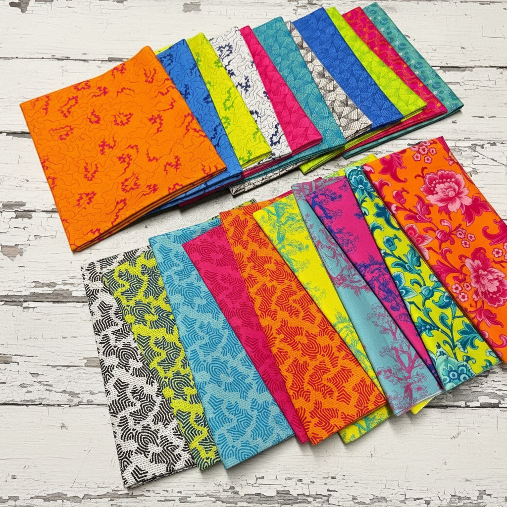 Patchwork with Busyfingers 21-piece Miscellany cotton fabric bundle featuring vibrant floral and geometric patterns.