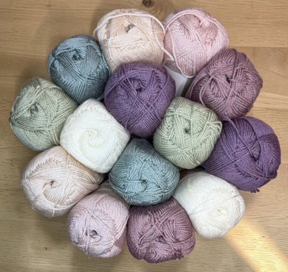 Patchwork with Busyfingers Mulberry Cottage Yarn Set in pastel shades of sage, cream, pink, purple, and moss. 100% anti-pilling acrylic yarn.