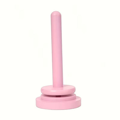 Patchwork with Busyfingers pink wooden rotating yarn butler for smooth yarn dispensing while knitting or crocheting.