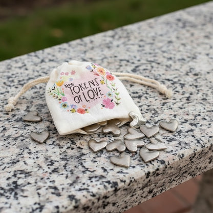 Patchwork with Busyfingers Bag of Pocket Tokens with floral design and 'Tokens of Love' text, scattered silver heart tokens.