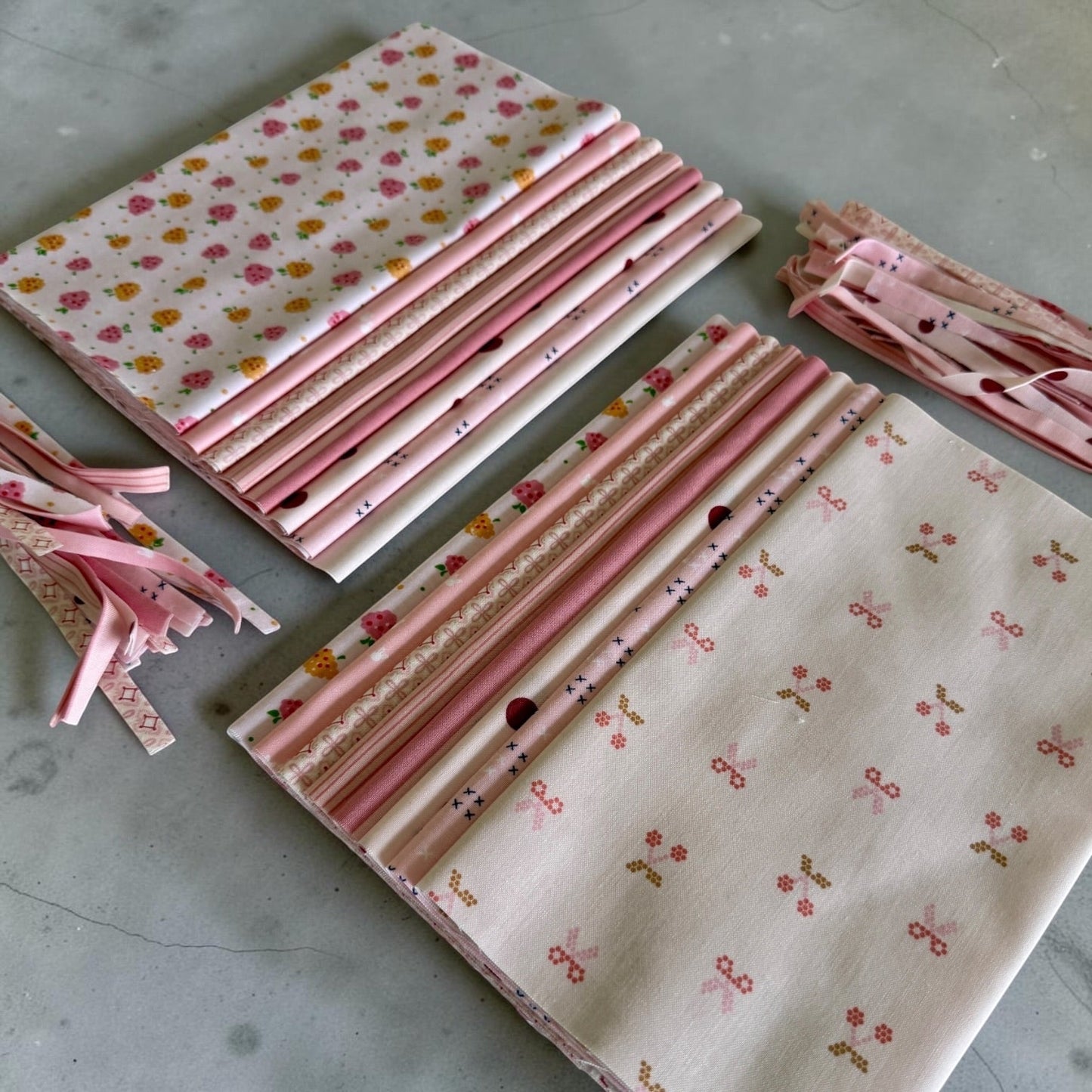 Patchwork with Busyfingers Powder Puff cotton fabric fat eighth pack featuring 8 assorted pink floral prints