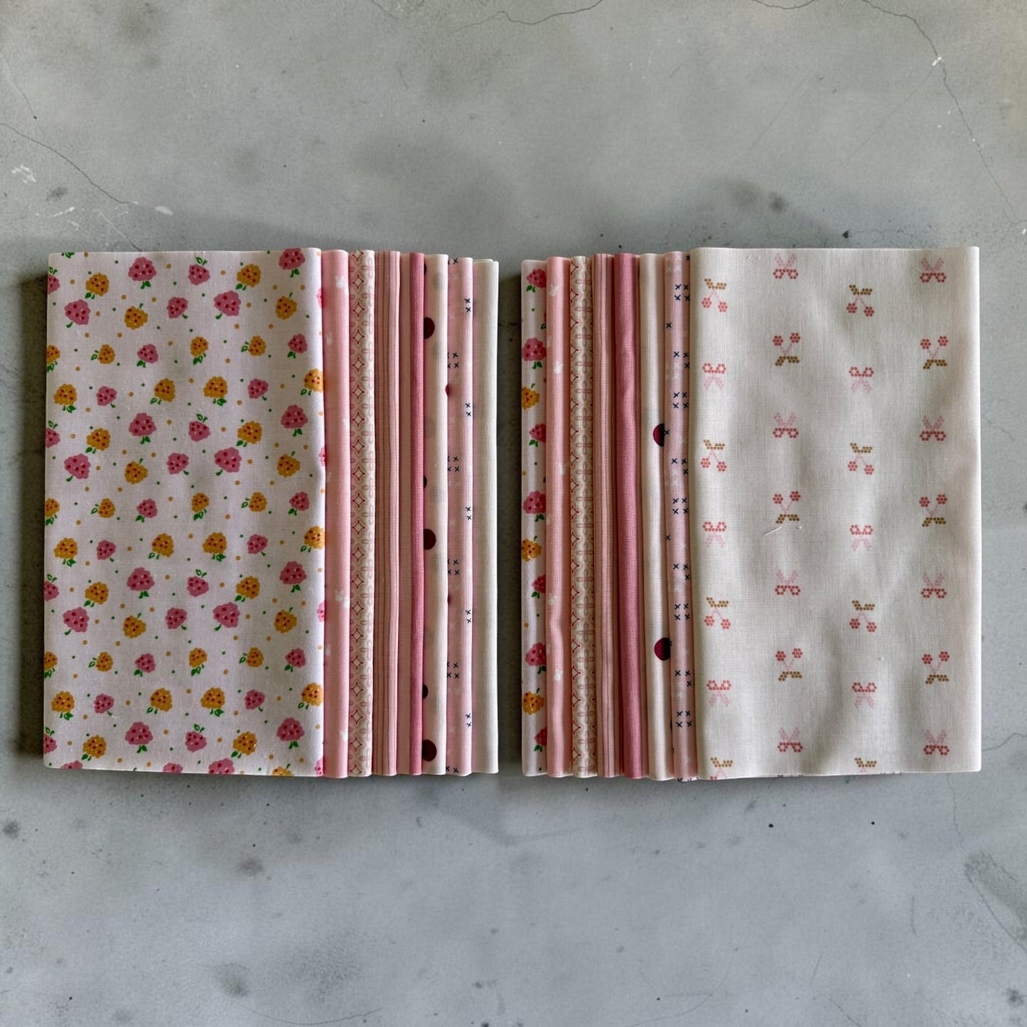 Patchwork with Busyfingers Powder Puff fat eighth fabric pack featuring 8 assorted pink and cream cotton prints.
