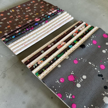Patchwork with Busyfingers Slate & Granite cotton fabric fat eighth pack featuring 8 assorted printed quilting squares.
