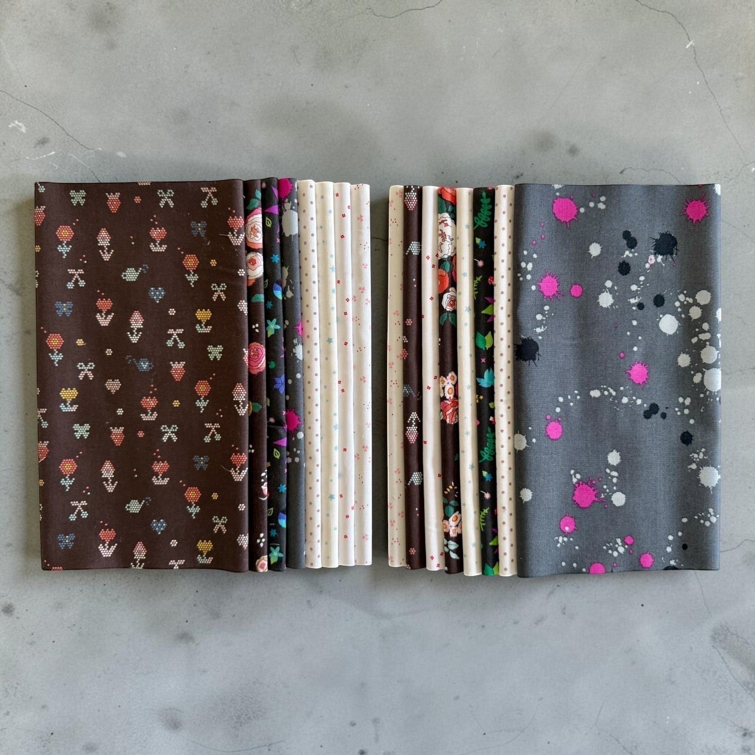 Patchwork with Busyfingers Slate & Granite fat eighth cotton fabric pack featuring 8 assorted floral and splatter prints