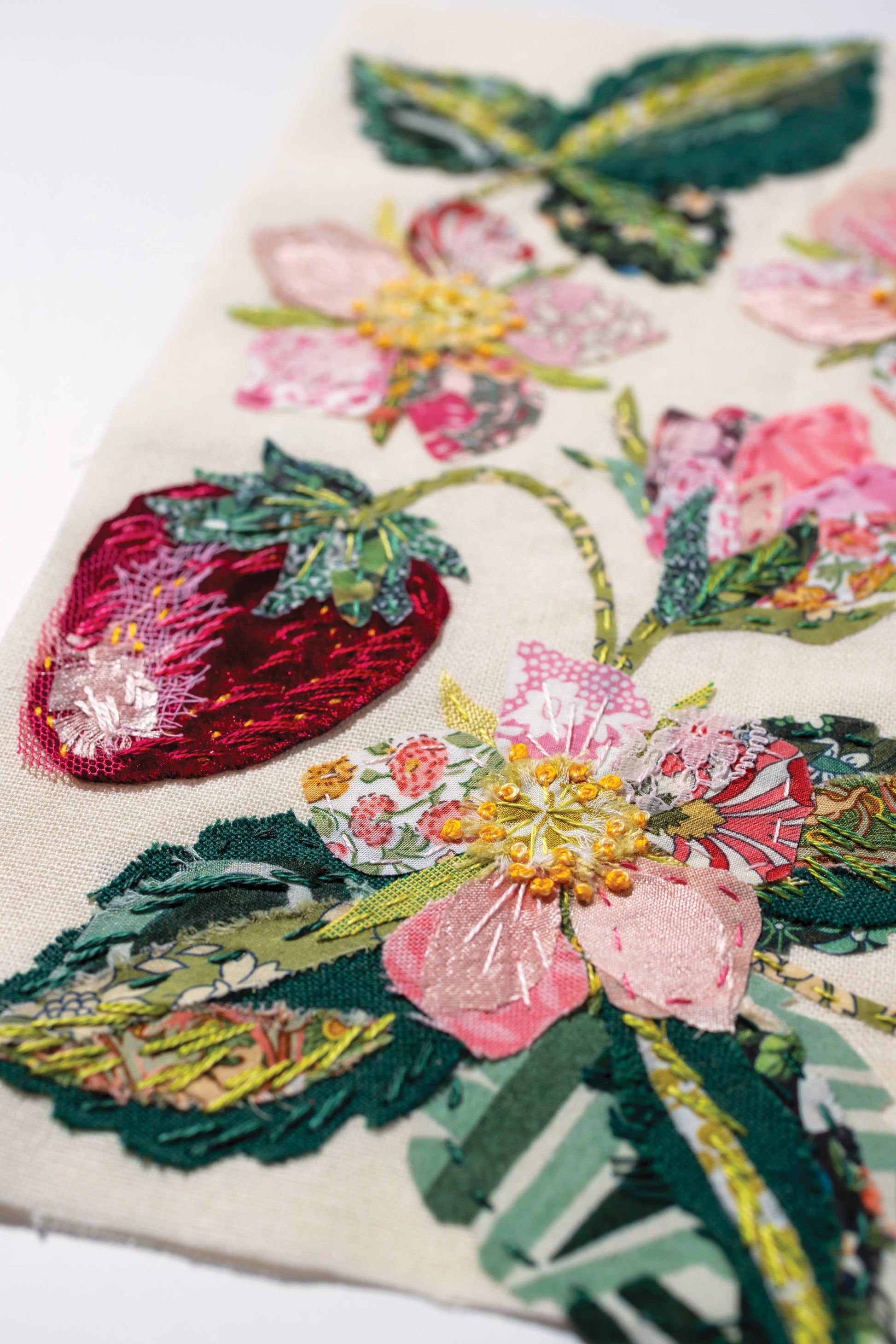 Patchwork with Busyfingers strawberry slow stitching kit featuring velvet, silk, and Liberty London fabric applique.