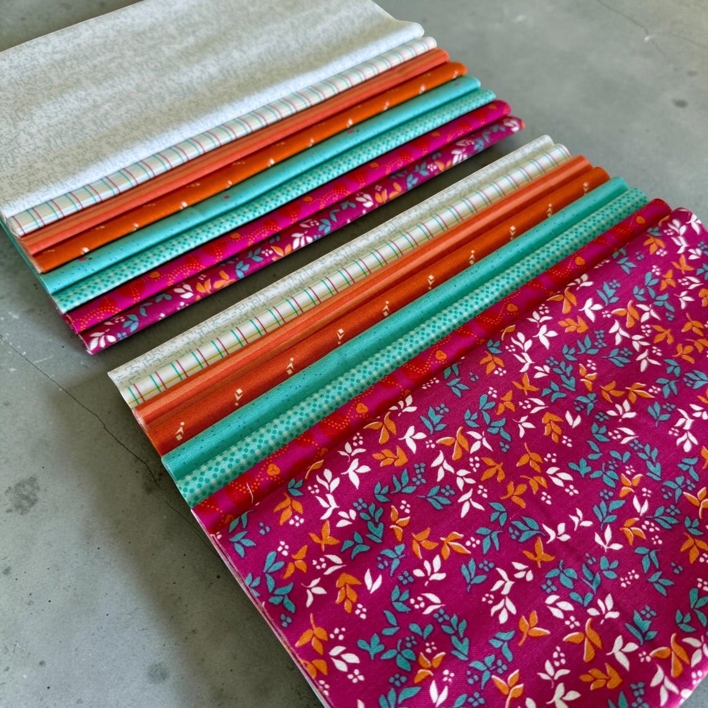 Patchwork with Busyfingers Sunset Splash 100% cotton fat eighth fabric pack with 8 assorted vibrant floral prints.