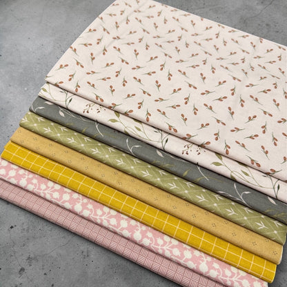 Patchwork with Busyfingers Threads of Grace 8pc cotton fabric bundle featuring floral, grid, and geometric patterns.