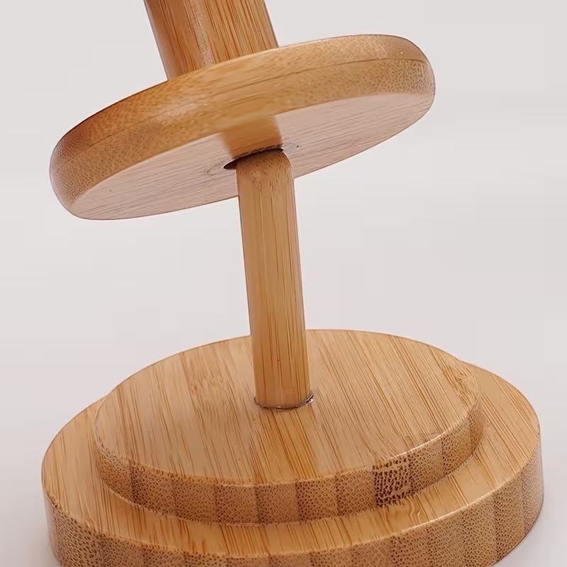 Patchwork with Busyfingers natural timber rotating yarn butler for smooth knitting and crochet yarn dispensing.