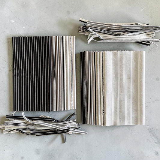 Patchwork with Busyfingers 8-piece cotton fabric fat eighth pack featuring assorted black and white tonal stripe prints.