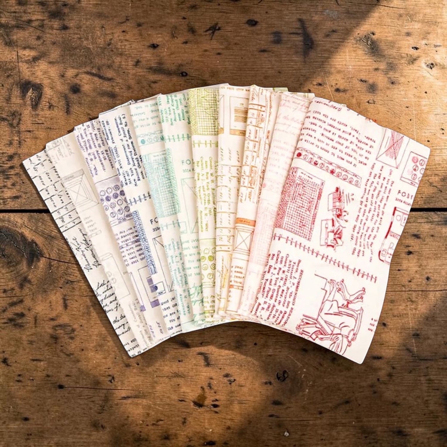 Patchwork with Busyfingers TYPEography 9pc cotton fabric bundle featuring vintage text and graphic prints.