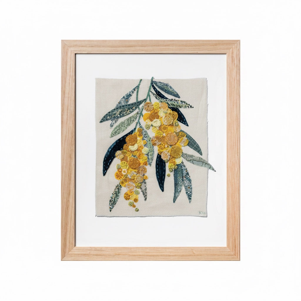 Patchwork with Busyfingers Wattle Glow slow stitching kit featuring a framed floral wattle design on linen fabric.
