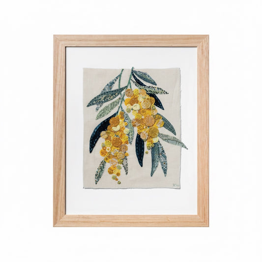 Patchwork with Busyfingers Wattle Glow slow stitching kit featuring a framed floral wattle design on linen fabric.