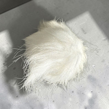 Patchwork with Busyfingers white plush faux fur pom pom for beanies with long soft synthetic fibers