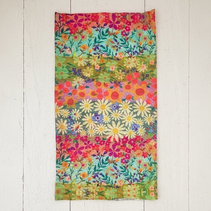 Patchwork with Busyfingers boho bandeau with a vibrant wildflower border print in pink, orange, yellow, green, and blue. Soft, stretchy fabric.