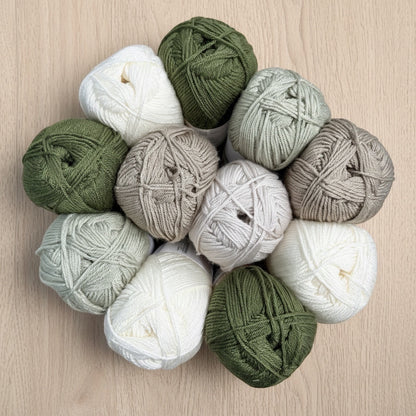Patchwork with Busyfingers Woodland Whispers yarn set in khaki, cream, natural, taupe, and sage. 100% anti-pilling acrylic yarn.