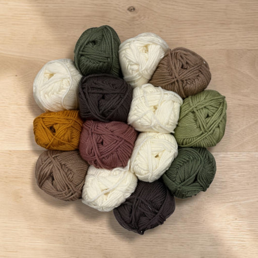 Patchwork with Busyfingers Gumleaf & Granite wool yarn set in white, toffee, forest green, rock grey, mustard, musk, and leaf green.