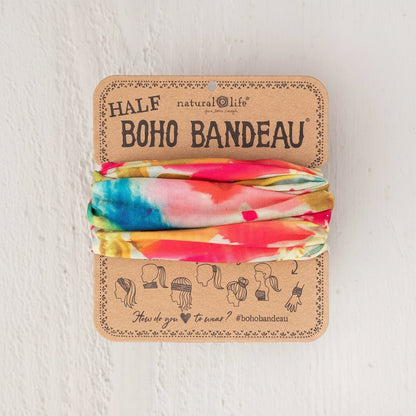 Patchwork with Busyfingers Boho Bandeau in abstract floral print with pink, yellow, blue, and green colors. Versatile accessory for hair or wrist.