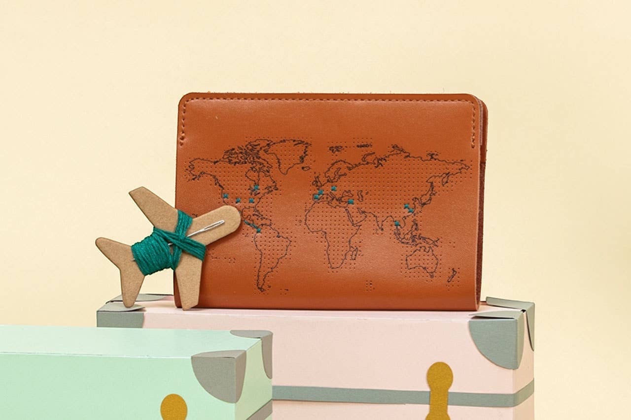 Patchwork with Busyfingers brown leather passport cover with world map design and emerald thread kit.