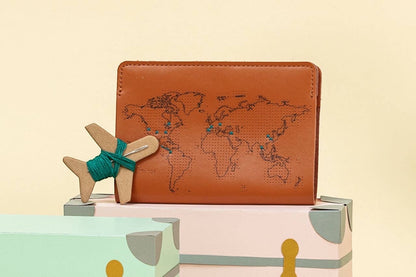 Patchwork with Busyfingers brown leather passport cover with world map design and emerald thread kit.
