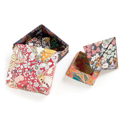 Patchwork with Busyfingers Liberty floral print origami treasure boxes, one red and white, one dark floral, one multi-coloured.
