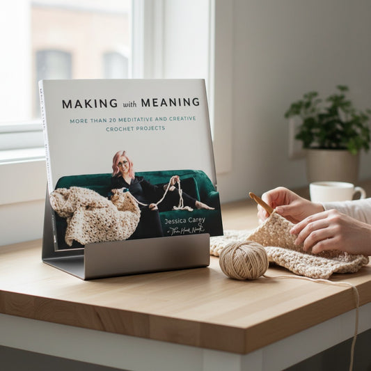 Patchwork with Busyfingers Making with Meaning book cover featuring Jessica Carey crocheting a large blanket. Paperback, 160 pages.