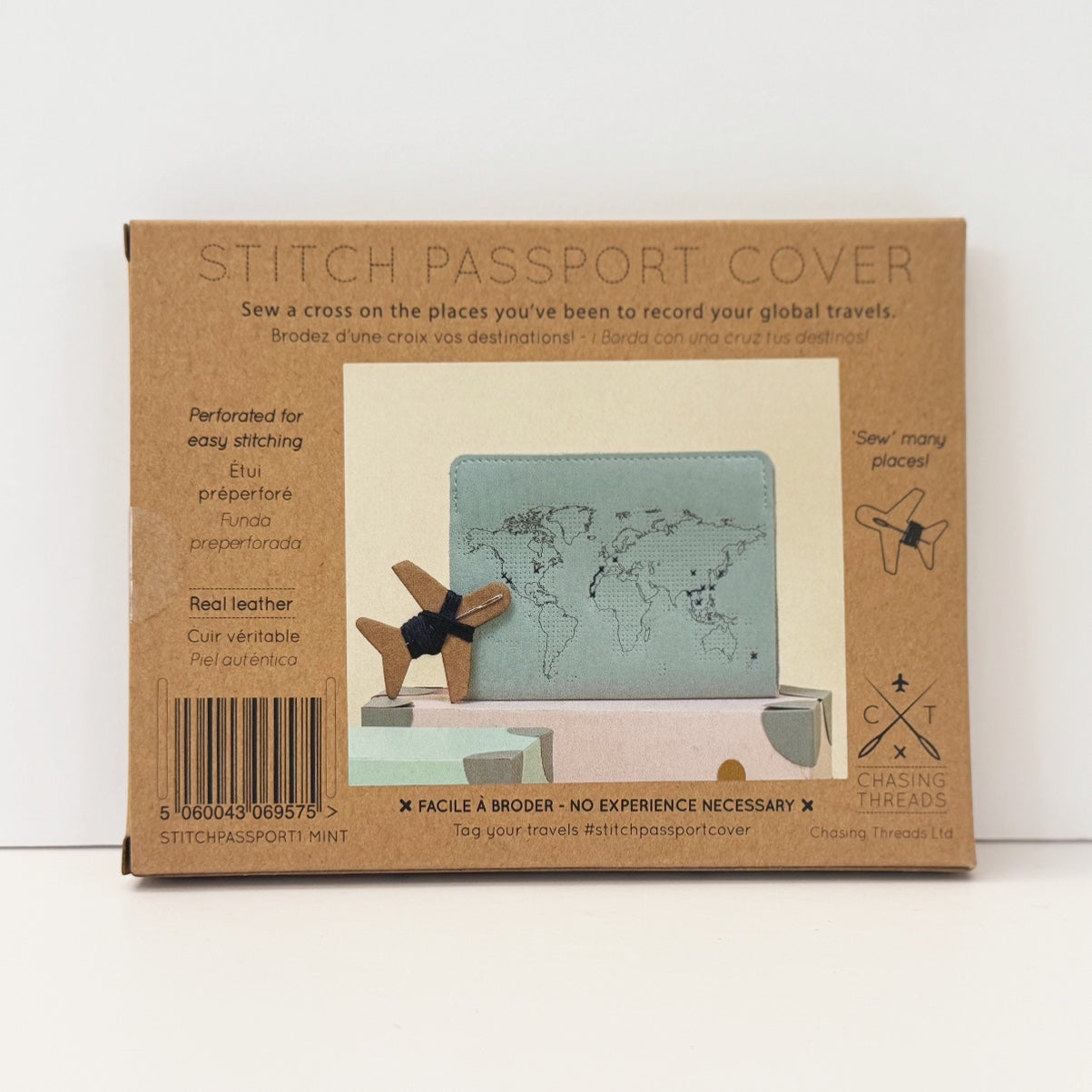 Patchwork with Busyfingers mint green leather passport cover kit with debossed world map for embroidery. Includes airplane charm.