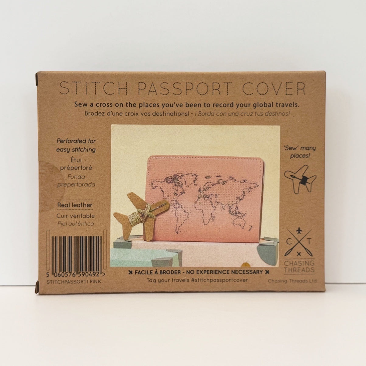 Patchwork with Busyfingers dusty pink leather passport cover kit with world map design, perforated for stitching.