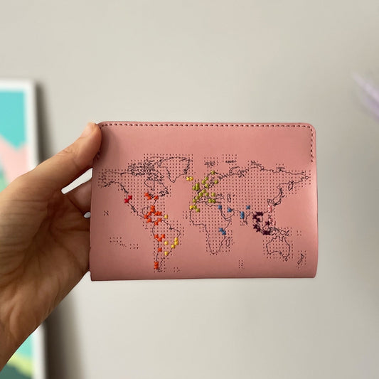 Patchwork with Busyfingers dusty pink leather passport cover with world map design, perforated for stitching visited countries.