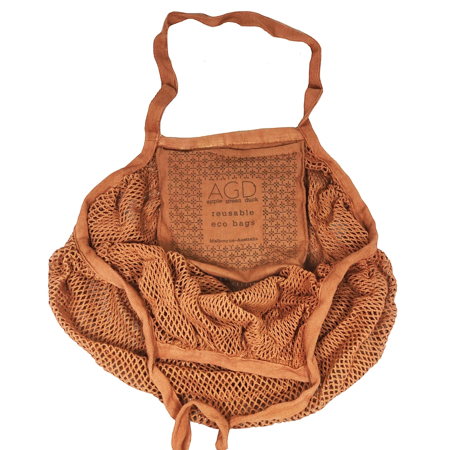 Patchwork with Busyfingers rust 100% cotton crescent net bag with long handles and a small pouch inside.